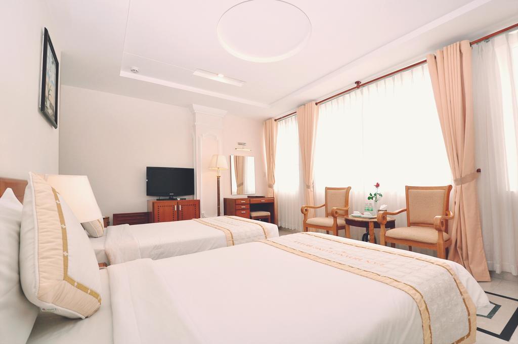 Tan Hoang Long Hotel Cidade de Ho Chi Minh Quarto foto